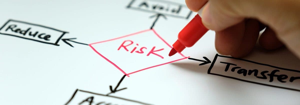 A secure online payment setup with card, laptop, and authentication device.